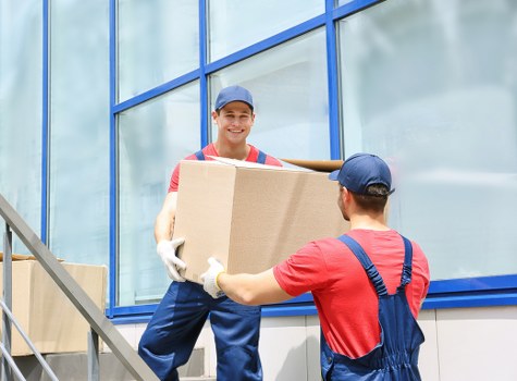 Office relocation planning in Temple with business moving boxes and labeled equipment